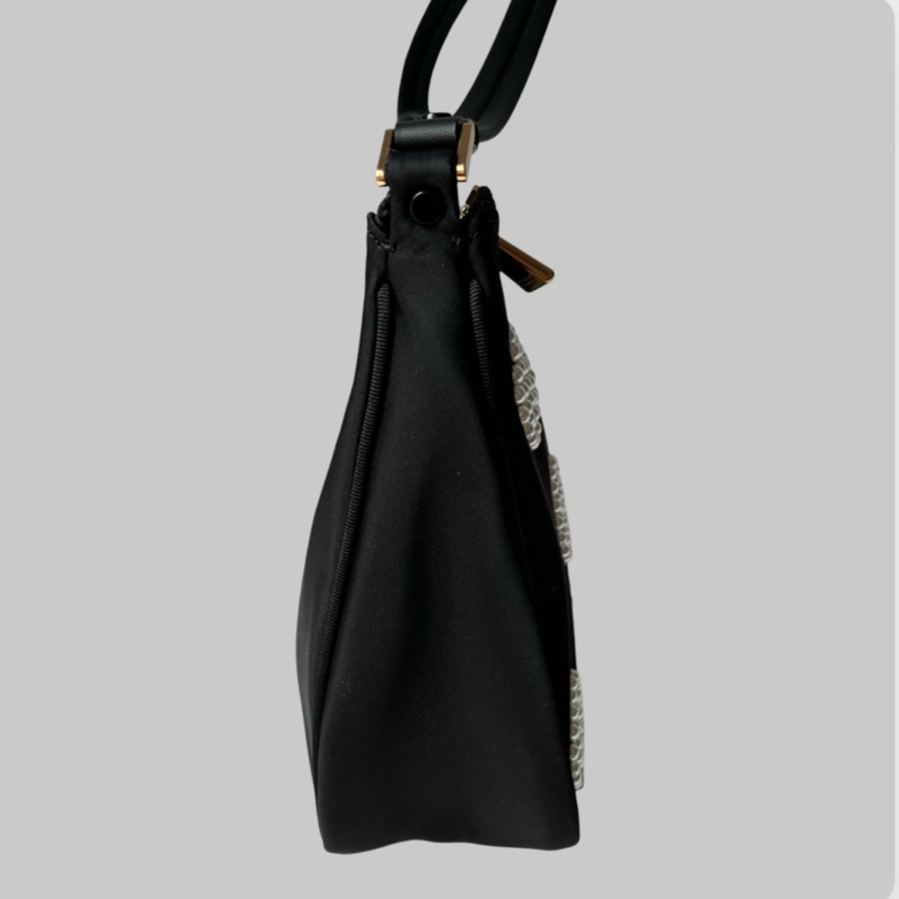 Kate Spade Embellished durable woven nylon with leather trim
Matte lining - Picture 10 of 12